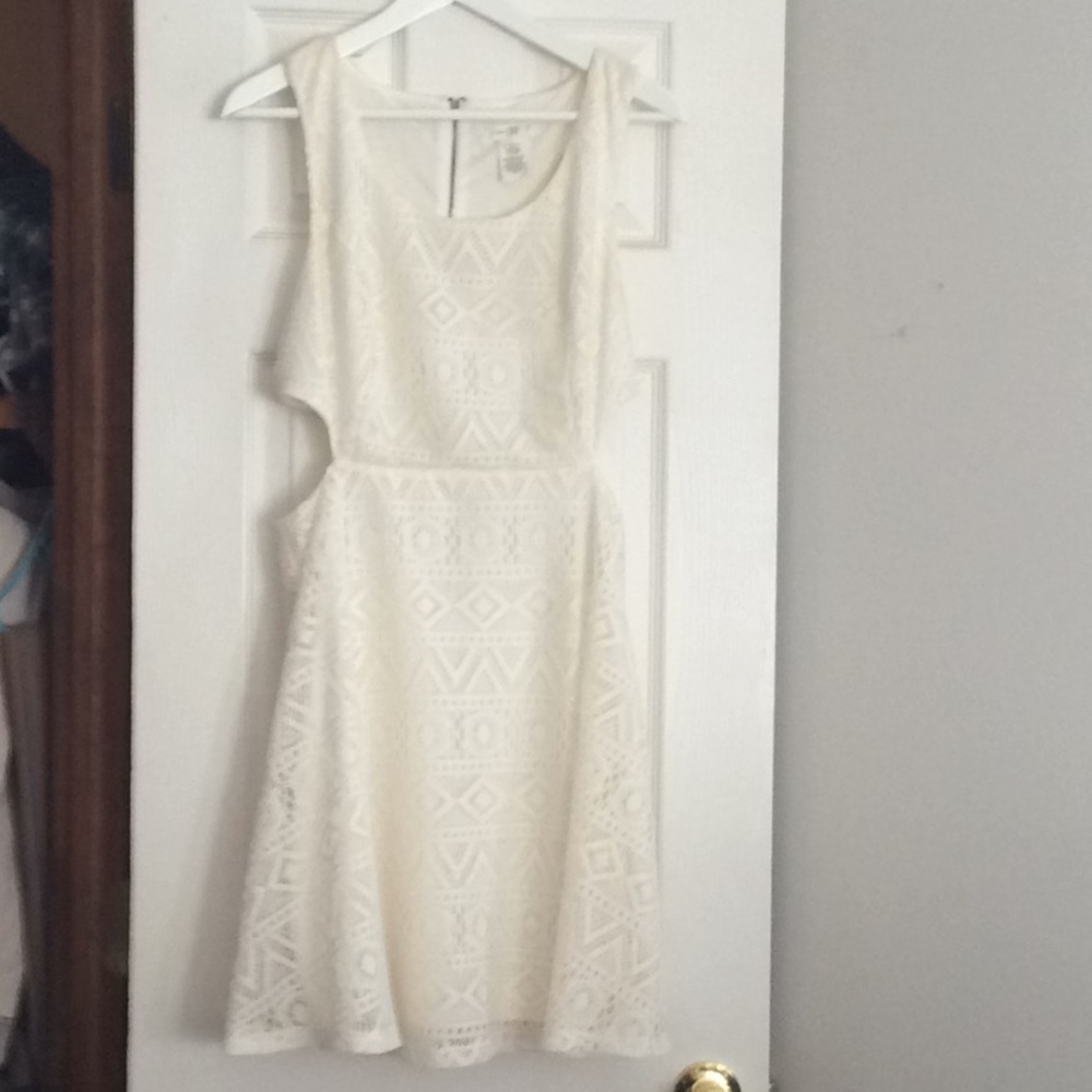 Lacy dress with cut out sides